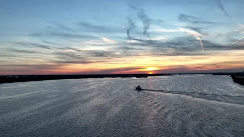 Aerial Drone Flight along Delaware River into the Sunset Stock Footage 168548414