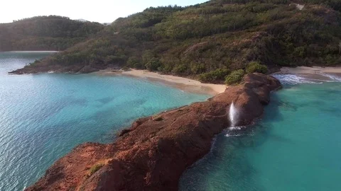 Aerial Drone Flight Antigua Beach Rocks & Fountain Stock Footage
