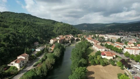 Aerial drone flight up Arno river Capolona Tuscany Italy  Stock Footage 194028009
