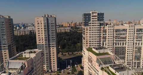 Aerial drone flight between new modern residential living quarter apartment Stock Footage 104499037