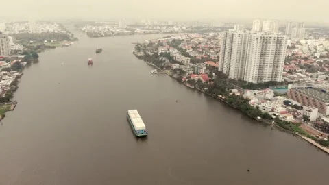 Aerial drone flight of drones cloudy weather overlooking the river with Stock Footage 141982170