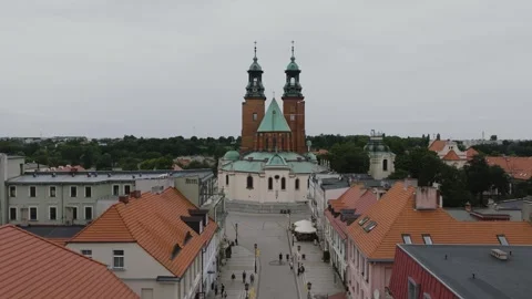 Aerial Drone Flight Forward and Rising Over Gniezno Old Town and Cathedral Stock Footage 325814091