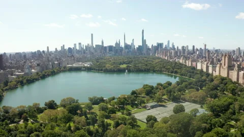 Aerial Drone Flight forward Dolly above Green Central Park in Manhattan, New Stock Footage 148272085
