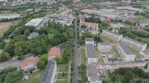 Aerial Drone Flight Forward Over Gniezno City Skyline Stock Footage 325817131