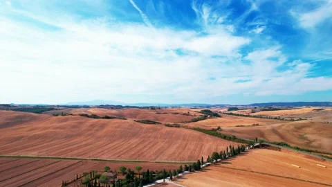 Aerial drone flight go head view Crete Senesi typical Tuscany panorama wheat 스톡 동영상 226786789