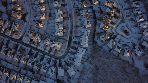 Aerial drone flight low over a suburban community on a bright day in winter. Stock-Footage 102203436