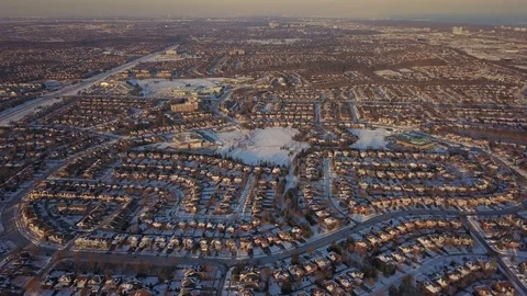 Aerial drone flight low over a suburban community on a bright day in winter. Stock-Footage 102203476
