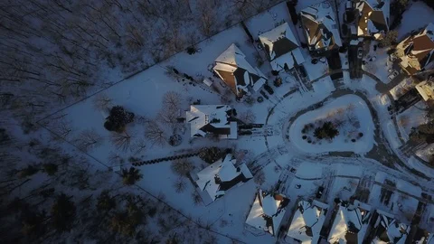 Aerial drone flight low over a suburban community on a bright day in winter. Stock Footage 102203524
