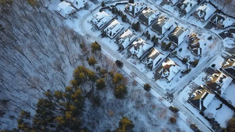 Aerial drone flight low over a suburban community on a bright day in winter. Stock-Footage 102203780