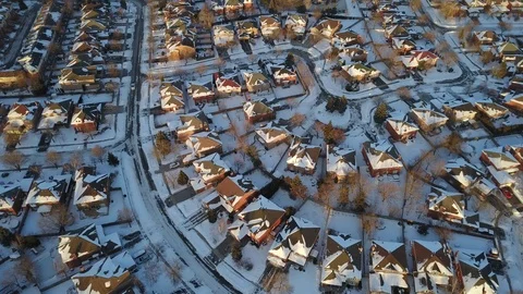 Aerial drone flight low over a suburban community on a bright day in winter. Stock-Footage 102203785