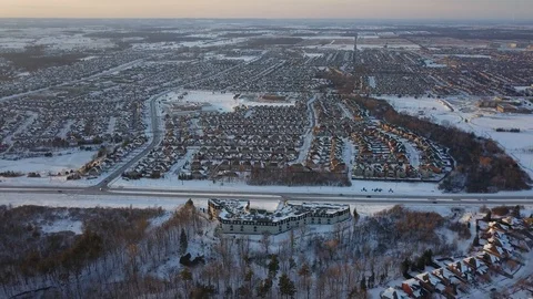 Aerial drone flight low over a suburban community on a bright day in winter. Stock-Footage 102203883