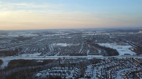 Aerial drone flight low over a suburban community on a bright day in winter. Stock-Footage 102203887