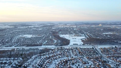 Aerial drone flight low over a suburban community on a bright day in winter. Stock-Footage 102203922