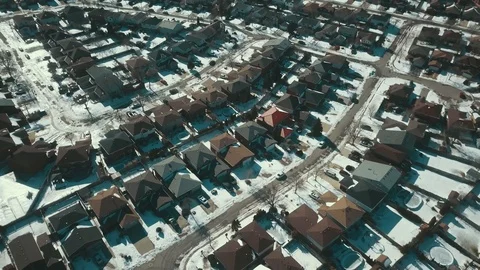Aerial drone flight low over a suburban community on a bright day in winter Stock-Footage 103061099