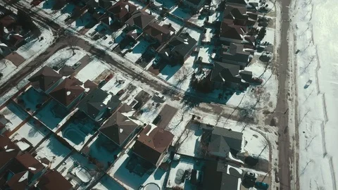 Aerial drone flight low over a suburban community on a bright day in winter Stock-Footage 103061147