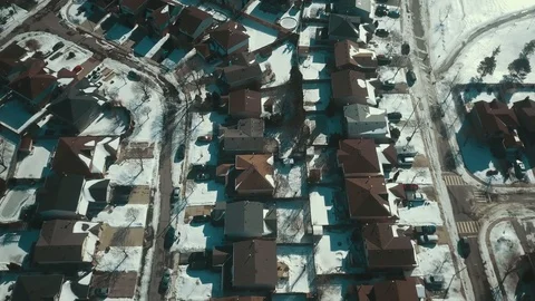 Aerial drone flight low over a suburban community on a bright day in winter Video stock 103061160
