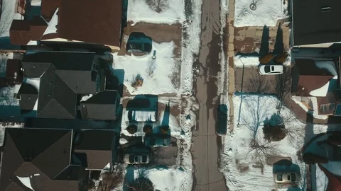 Aerial drone flight low over a suburban community on a bright day in winter Stock-Footage 103061285