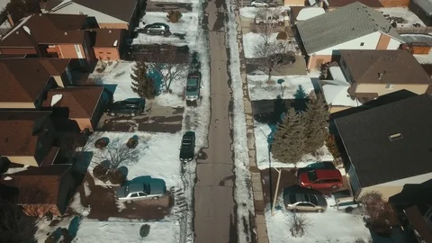 Aerial drone flight low over a suburban community on a bright day in winter Video stock 103061457