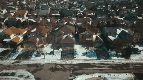 Aerial drone flight low over a suburban community on a bright day in winter Stock-Footage 103061877