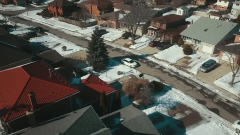 Aerial drone flight low over a suburban community on a bright day in winter Stock-Footage 103062057