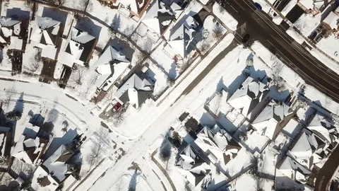 Aerial drone flight low over a suburban community on a bright day in winter. Stock-Footage 103824665