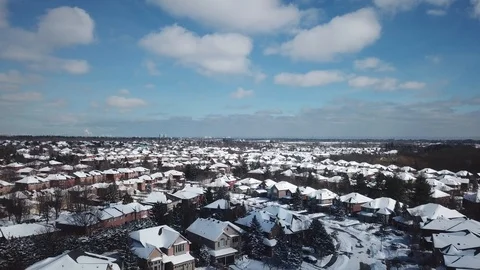 Aerial drone flight low over a suburban community on a bright day in winter. Stock-Footage 103824792