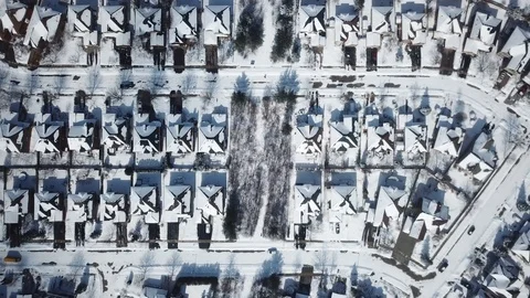 Aerial drone flight low over a suburban community on a bright day in winter. Stock-Footage 103824863