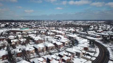 Aerial drone flight low over a suburban community on a bright day in winter. Stock Footage 103824871