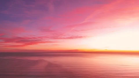 Aerial drone flight over Atlantic Ocean at sunset in Algarve, Portugal Stock Footage 332403373