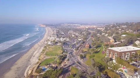 Aerial Drone flight over beach at Del Mar near train tracks - San Diego, CA Stock-Footage 88256572