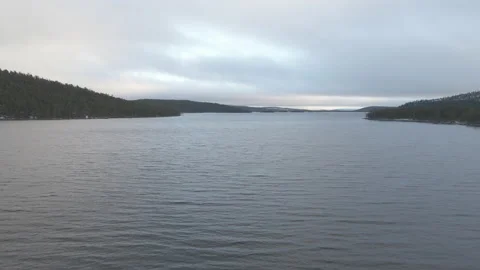 Aerial Drone Flight Over Finish Lake On Cloudy Day Stock Footage 225824104