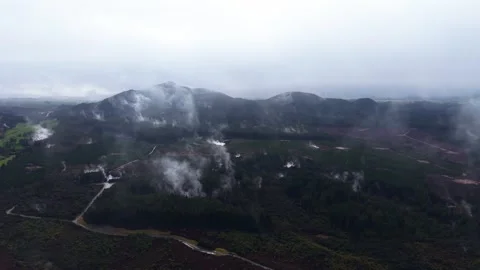 Aerial Drone Flight Over Geothermal Fields: Active Craters and Fumaroles at Stock Footage 346477843