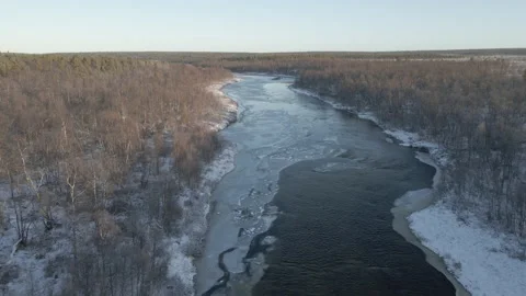 Aerial Drone Flight Over Half Frozen River In Lapland During Winter Sunny Day Stock Footage 223001298