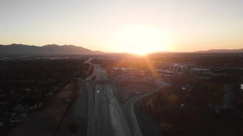 Aerial Drone Flight Over Highway at Sunset Stock Footage 249027186