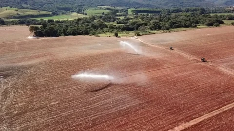 Aerial drone flight over irrigated field for agriculture Stock Footage 114888097