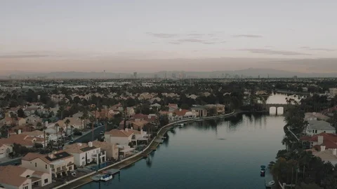 Aerial drone flight over Las Vegas suburb on lake Stock Footage 100458478
