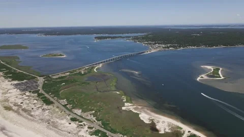 Aerial Drone Flight Over Long Island Beach - Ponquogue Bridge Hamptons Stock Footage 163311549
