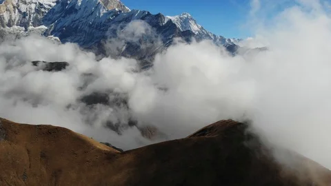Aerial Drone Flight Over Mountain Range Through Clouds. Stock Footage 102373108