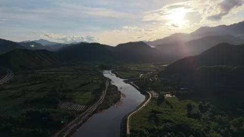Aerial Drone Flight Over Mountain River Valley at Sunset in Vietnam Video stock 337948628