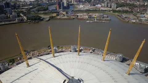 Aerial drone flight over the O2 stadium on a sunny day in London England. 스톡 동영상 91518235