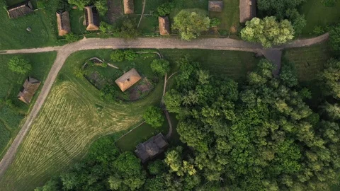 Aerial drone flight over old houses in settlement, Park Museum Pirohovo, Kyiv Stock Footage 117366708