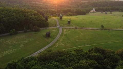 Aerial drone flight over old mills in settlement, Park Museum Pirohovo, Kyiv Stock Footage 117367144