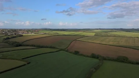 Aerial Drone flight Over Patchwork Fields Agricultural Landscape in Cornwall Stock-Footage 336640920