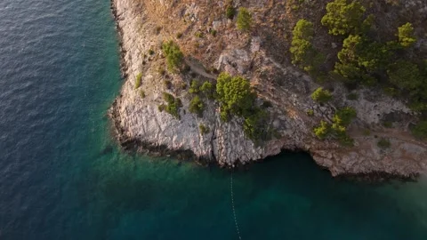 Aerial Drone Flight Over a Rugged Rocky Coastline in Croatia Video stock 320145928