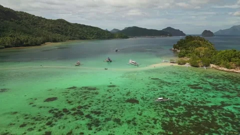 Aerial Drone Flight Over Snake Island and Tropical Waters in Palawan Video stock 344329587