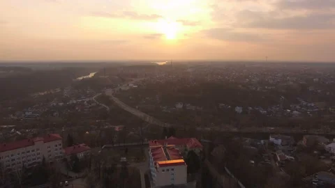 Aerial drone flight over suburban area at small town highway Stock Footage 113686487