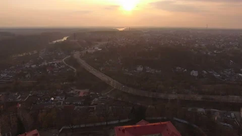 Aerial drone flight over suburban area at small town highway Stock Footage 113686668