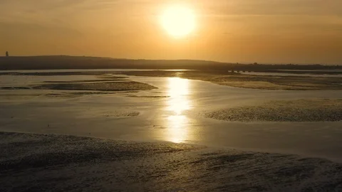 Aerial drone flight over sunset at the bay, Bali, Indonesia, 4k Video stock 122587940