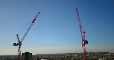 Aerial Drone flight over Tower Cranes in London, England. Stock-Footage 82379307