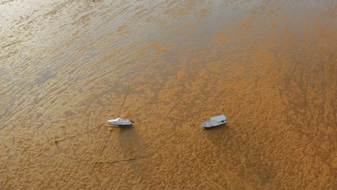 Aerial drone flight over two boats aground, Bali, Indonesia, 4k Stock Footage 122588293